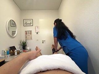 Latvian nurse Eva Keks strokes patient cock in massage room